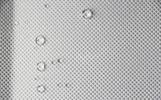 comprar La prenda impermeable ACARICIA el alto grado 10-200gsm respirable de la tela no tejida para las cortinas aisladores online manufacture