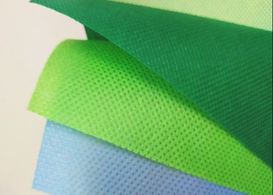 comprar Tela no tejida verde y roja 100% PP Spunbond para bolsos de compras online manufacture