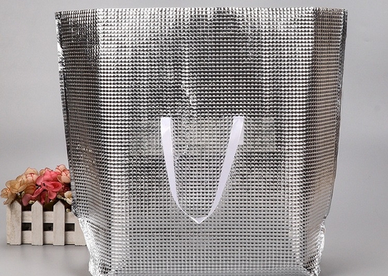 comprar Tejido laminado no tejido de color personalizable para bolsas de paquetes online manufacture